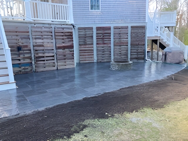Stone Walkway and patio from a house in Brewster, MA. Designed by Cape Cod Hardscapes