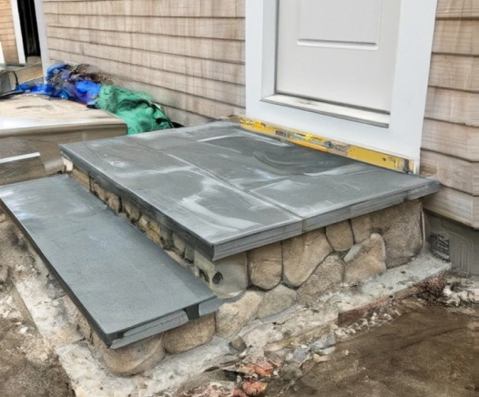 Natural Stone steps from a house in Provincetown, MA. Designed by Cape Cod Hardscapes